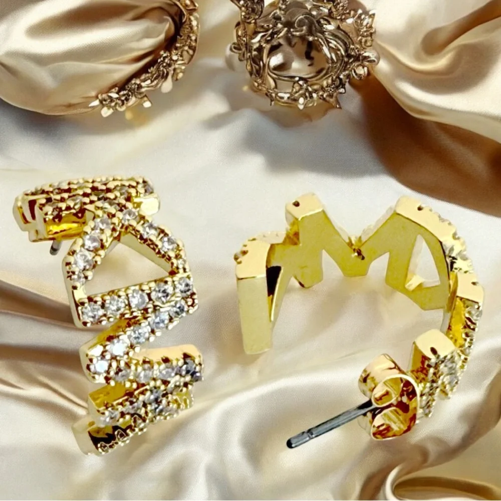 Michael Kors 14K Gold-Plated Brass Logo Huggie earrings. - Picture 4 of 6